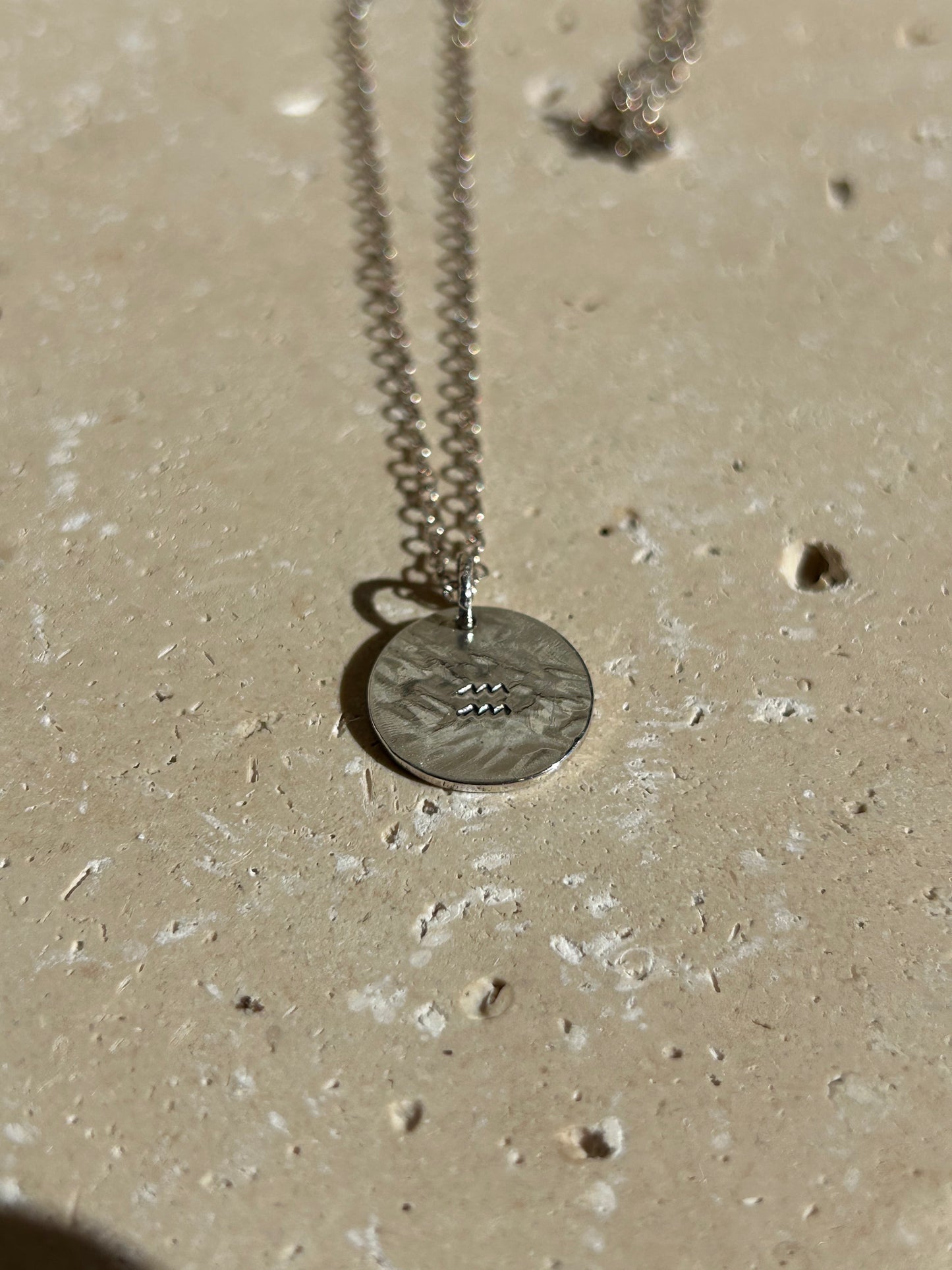 Collier Astro